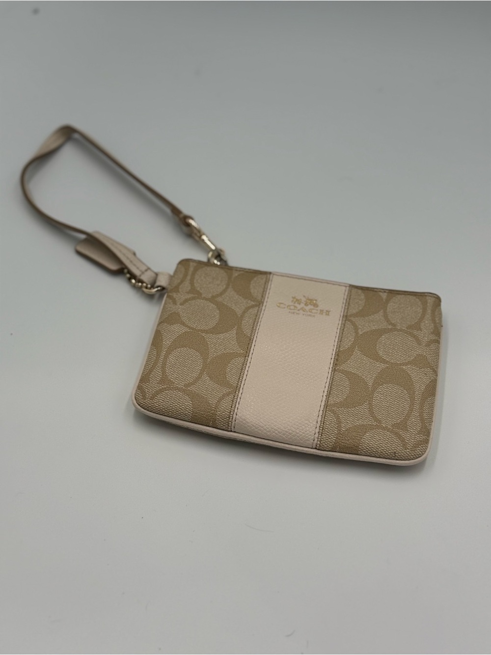 Coach monogram legacy stripe wristlet